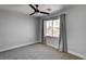 Well lit bedroom featuring a ceiling fan and a window with views at 401 Sonoma Valley St, Las Vegas, NV 89144