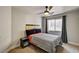 Cozy bedroom with modern decor, featuring a queen bed, stylish headboard, and neutral color scheme at 401 Sonoma Valley St, Las Vegas, NV 89144
