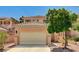 Charming two-story home featuring a tile roof, desert landscaping, and an attached two-car garage at 401 Sonoma Valley St, Las Vegas, NV 89144