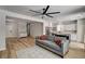 Spacious living room featuring an open concept with a kitchen, modern flooring, and ample natural light at 401 Sonoma Valley St, Las Vegas, NV 89144