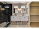 Stylish main bathroom with double vanity, marble countertop, modern fixtures, and a glass-enclosed shower at 401 Sonoma Valley St, Las Vegas, NV 89144