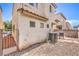 Backyard with stone pavers, providing low-maintenance outdoor living, and an HVAC system at 4037 Asante Cove St, Las Vegas, NV 89115