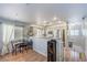 Bright and airy kitchen with stainless steel appliances, a breakfast bar, and modern lighting, perfect for cooking and entertaining at 4037 Asante Cove St, Las Vegas, NV 89115