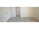 This is a light and bright bedroom with modern light-colored floors and closet with sliding doors at 4354 Thorndale Pl, Las Vegas, NV 89103