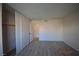 This is a light and bright bedroom with modern light-colored floors and closet with sliding doors at 4354 Thorndale Pl, Las Vegas, NV 89103