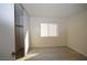 This is a light and bright bedroom with modern light-colored floors and closet with sliding doors at 4354 Thorndale Pl, Las Vegas, NV 89103