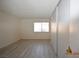 Bedroom features wood floors, closet, and a window at 4354 Thorndale Pl, Las Vegas, NV 89103