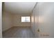 Bedroom features wood floors, closet, and a window at 4354 Thorndale Pl, Las Vegas, NV 89103