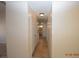Neutral hallway offers access to bedrooms, bathroom, and extra storage at 4354 Thorndale Pl, Las Vegas, NV 89103