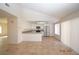 Bright and open kitchen with white cabinetry, stainless steel appliances, and tile flooring at 4354 Thorndale Pl, Las Vegas, NV 89103