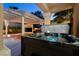 Relaxing hot tub area with a covered patio and views of the backyard at 464 Beardsley Cir, Henderson, NV 89052