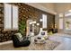 Cozy sitting area with large windows and comfortable seating at 464 Beardsley Cir, Henderson, NV 89052