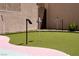 Backyard putting green for golf enthusiasts at 464 Beardsley Cir, Henderson, NV 89052