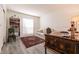 Cozy living room with comfortable seating, decorative rug, and natural light creates a welcoming space at 5028 Glenarden Dr, Las Vegas, NV 89130