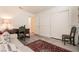 Cozy living room with comfortable seating, decorative rug, and natural light creates a welcoming space at 5028 Glenarden Dr, Las Vegas, NV 89130