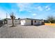Well-maintained single-story home featuring a rock lawn and an updated exterior with a modern design at 5069 Hallet Dr, Las Vegas, NV 89122