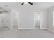 Bedroom with neutral carpet and walk-in closets at 5116 Iron Crossing Ave, Las Vegas, NV 89131