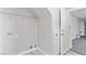 Utility space featuring storage shelves and convenient access to the garage at 5116 Iron Crossing Ave, Las Vegas, NV 89131
