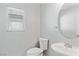 Convenient powder room featuring modern fixtures and a toilet at 5116 Iron Crossing Ave, Las Vegas, NV 89131