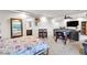 Basement area with seating, a foosball table, and a bed at 5889 Thistle Meadow Ave, Las Vegas, NV 89139