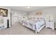 Bedroom with Queen size bed, dresser, walk-in closet and views to the loft at 5889 Thistle Meadow Ave, Las Vegas, NV 89139