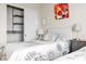 Bedroom featuring twin beds, closet and tasteful floral decor on the walls at 5889 Thistle Meadow Ave, Las Vegas, NV 89139