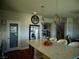 A modern kitchen featuring granite countertops, stainless steel appliances, and pendant lighting at 5889 Thistle Meadow Ave, Las Vegas, NV 89139
