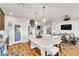 Spacious kitchen with a large island, stainless steel appliances, wood floors, and modern lighting at 5889 Thistle Meadow Ave, Las Vegas, NV 89139
