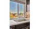 Modern kitchen sink with a view of the neighborhood at 5889 Thistle Meadow Ave, Las Vegas, NV 89139