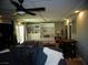 Game room features murphy bed, coffered ceilings, foosball table, and built-ins at 5889 Thistle Meadow Ave, Las Vegas, NV 89139