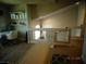Cozy loft space with comfortable seating, a work desk, and charming decor creating a relaxing ambiance at 5889 Thistle Meadow Ave, Las Vegas, NV 89139