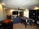 Fun recreation room featuring a foosball table, large TV, and comfortable seating at 5889 Thistle Meadow Ave, Las Vegas, NV 89139