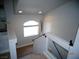 A well-lit staircase features glass accents and a large window at 5889 Thistle Meadow Ave, Las Vegas, NV 89139
