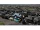 Aerial view of estate featuring a pool and covered patio and views of golf course and neighboring homes at 6 Yorkridge Ct, Henderson, NV 89052