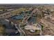 Explore the community amenities, including tennis courts, playground, and green spaces in this inviting aerial view at 6 Yorkridge Ct, Henderson, NV 89052