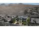 Stunning aerial view of a luxurious home nestled in a scenic desert community at 6 Yorkridge Ct, Henderson, NV 89052