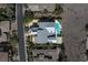 Aerial view of modern home showcasing landscaped yard and inviting swimming pool at 6 Yorkridge Ct, Henderson, NV 89052