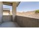 A concrete balcony with a view of the desert featuring mountain views and concrete walls at 6 Yorkridge Ct, Henderson, NV 89052