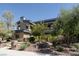 Stunning multi-story home featuring modern architectural design and lush landscaping at 6 Yorkridge Ct, Henderson, NV 89052