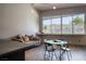 Comfortable game room with stylish lighting, large windows, and mountain views at 6 Yorkridge Ct, Henderson, NV 89052