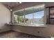 Bright room features large window with pool view, stylish decor, and pool table accessories at 6 Yorkridge Ct, Henderson, NV 89052