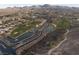 Aerial view of golf course with lush greenery and serene lakes at 6 Yorkridge Ct, Henderson, NV 89052