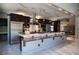 Expansive kitchen featuring stainless steel appliances and a large island with seating at 6 Yorkridge Ct, Henderson, NV 89052