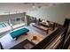 Aerial view showcasing open-concept space, including billiards table, chef's kitchen, and a cozy living area at 6 Yorkridge Ct, Henderson, NV 89052