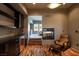 Stylish living area with a fireplace, wet bar, and hardwood floors at 6 Yorkridge Ct, Henderson, NV 89052