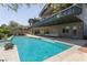 Sparkling pool with travertine decking and a covered dining area, perfect for outdoor entertaining at 6 Yorkridge Ct, Henderson, NV 89052