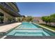 Backyard pool view featuring crystal clear blue water and a beautiful view of home's architecture at 6 Yorkridge Ct, Henderson, NV 89052