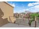 Balcony view of a well-maintained street and neighboring houses at 6284 Anticline Ave, Las Vegas, NV 89139