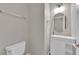Stylish bathroom with a modern vanity, sleek fixtures, and a round mirror at 6284 Anticline Ave, Las Vegas, NV 89139