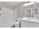 Full bathroom with a tiled shower-tub combination and a modern vanity at 6284 Anticline Ave, Las Vegas, NV 89139